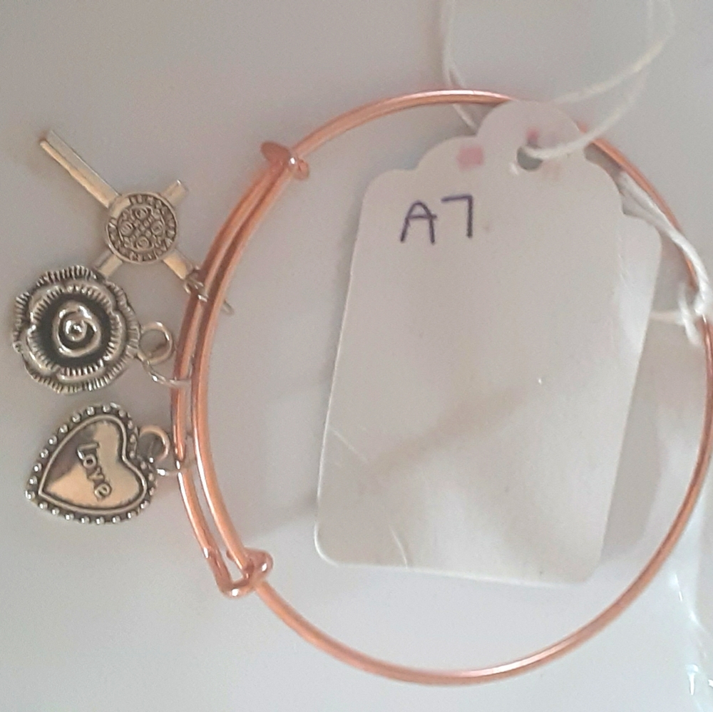 Adjustable bangle bracelet with charms